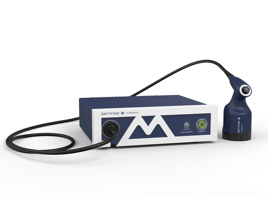 Medical device with a control box and attached handheld unit labeled ww5, likely for healthcare use.
