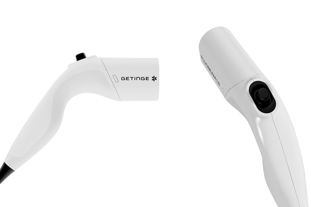 Fluobeam LS handheld near‑infrared fluorescence imaging camera by ww5, front and rear views on white background.