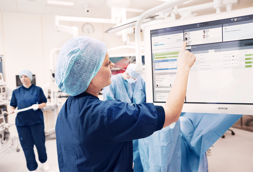 OR-nurse-updating-Torin-surgical-progress-information-with-Torin-OR-management-solution-from-ww5