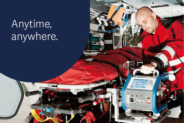 Paramedic tending to a patient inside an ambulance with the text Anytime, anywhere.