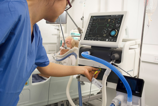 Doctor with Servo-air ventilator